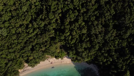 Revealing-Top-View-of-Blue-Lagoon-Beach-in-Sivota,-Greece