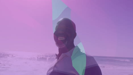 at beach, man smiling with colorful abstract animation shapes overlaying scenery