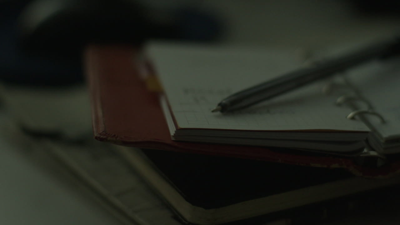 Close-up of a dark notebook