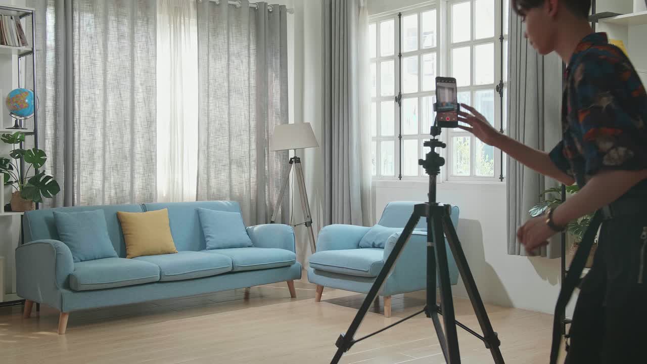 Man Dancing and Recording a Video Tutorial