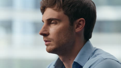 close up focused businessman working in office. employee reading information