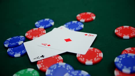 playing cards and casino chips on poker table 4k