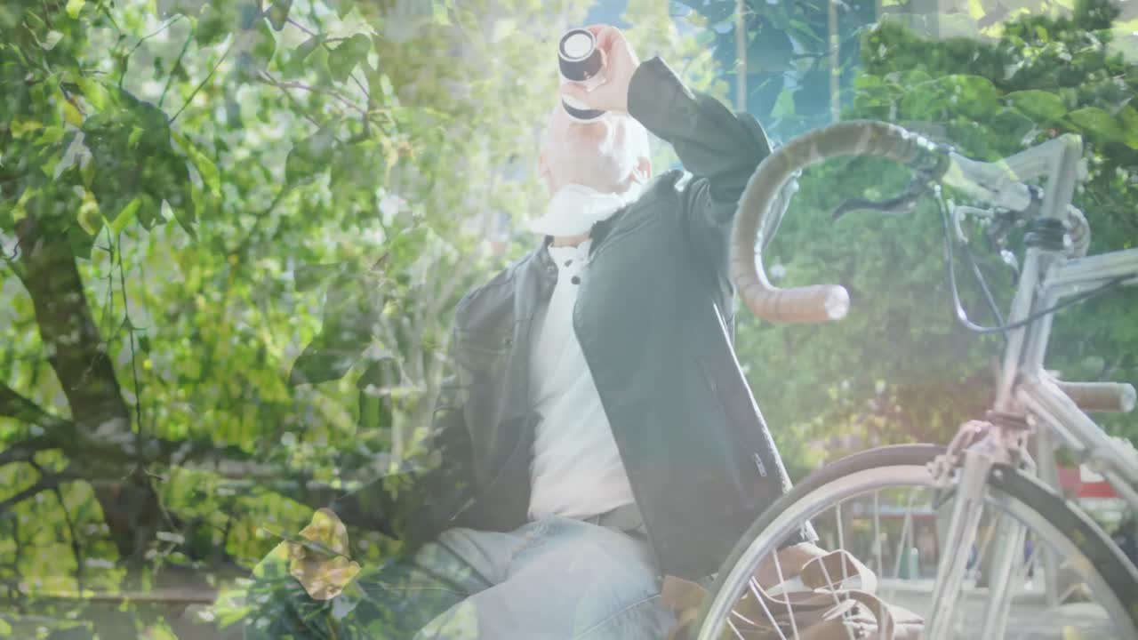 커피를 마시는 백인 남성 위에 잎의 애니메이션