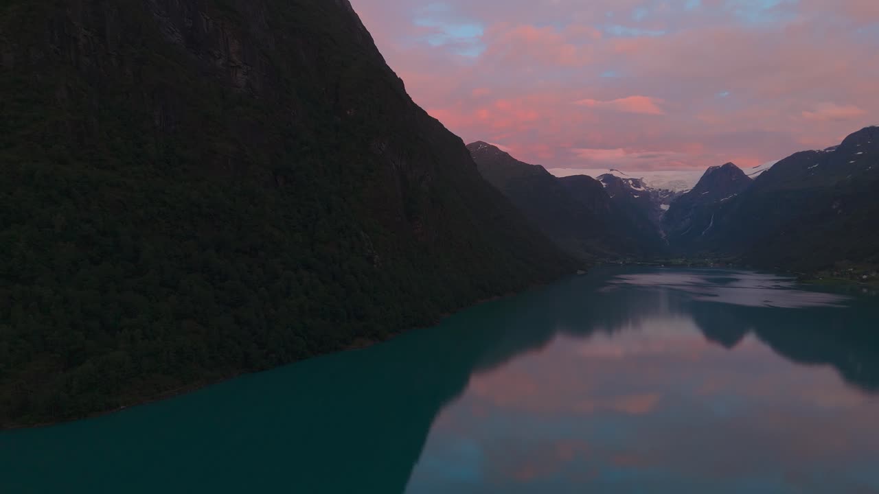 Oldevatnet lake at Briksdalsbreen glacier. Norway Scandinavia nature sunset sky water reflection