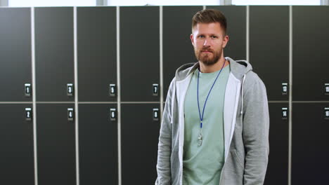 Man-posing-in-locker-room