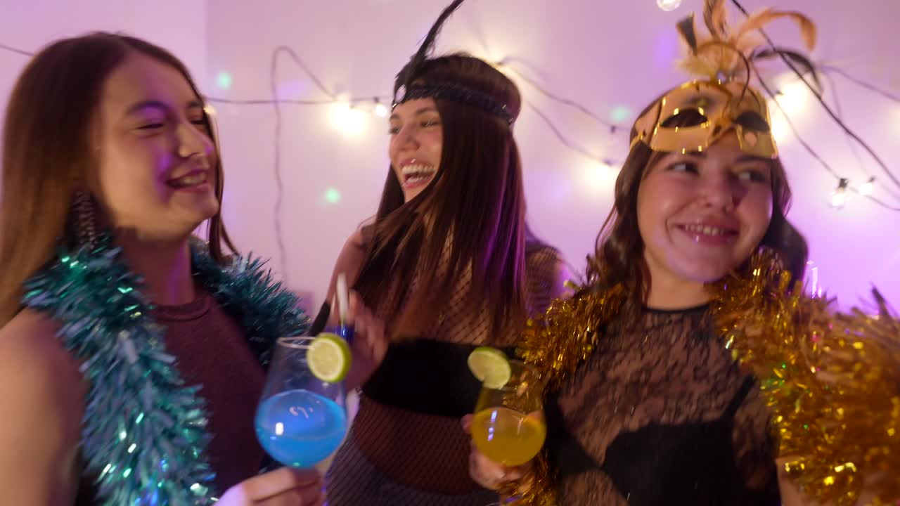 Women Enjoying a Party with Cocktails
