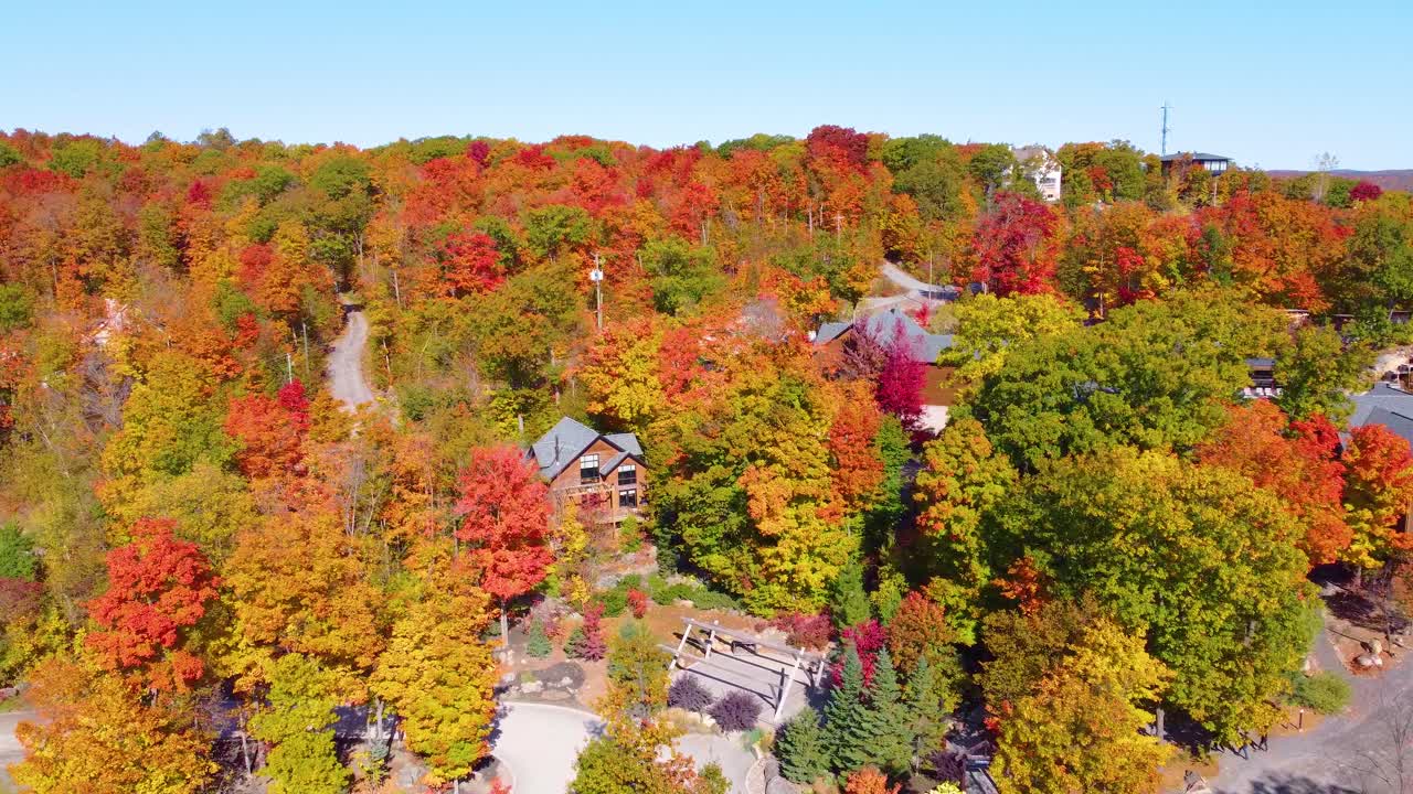 Vibrant Autumn Colors Surround The Rural Town In Estrie Region, Québec, Canada. Aerial Drone Shot