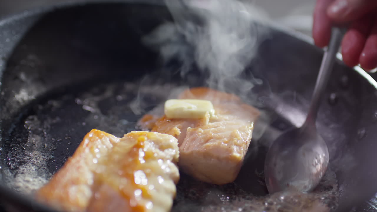 Cooking Fish Fillet with Butter in Frying Pan