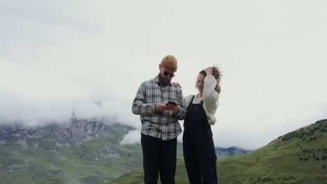 couple enjoying the mountains