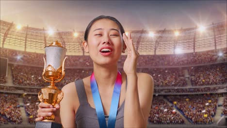 excited woman celebrating victory in a stadium