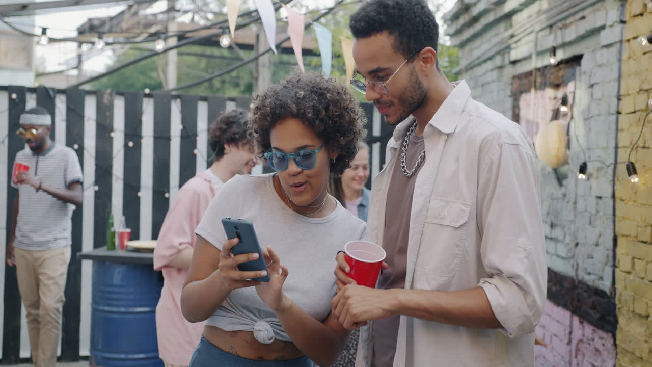 Friends Enjoying a Summer Backyard Party