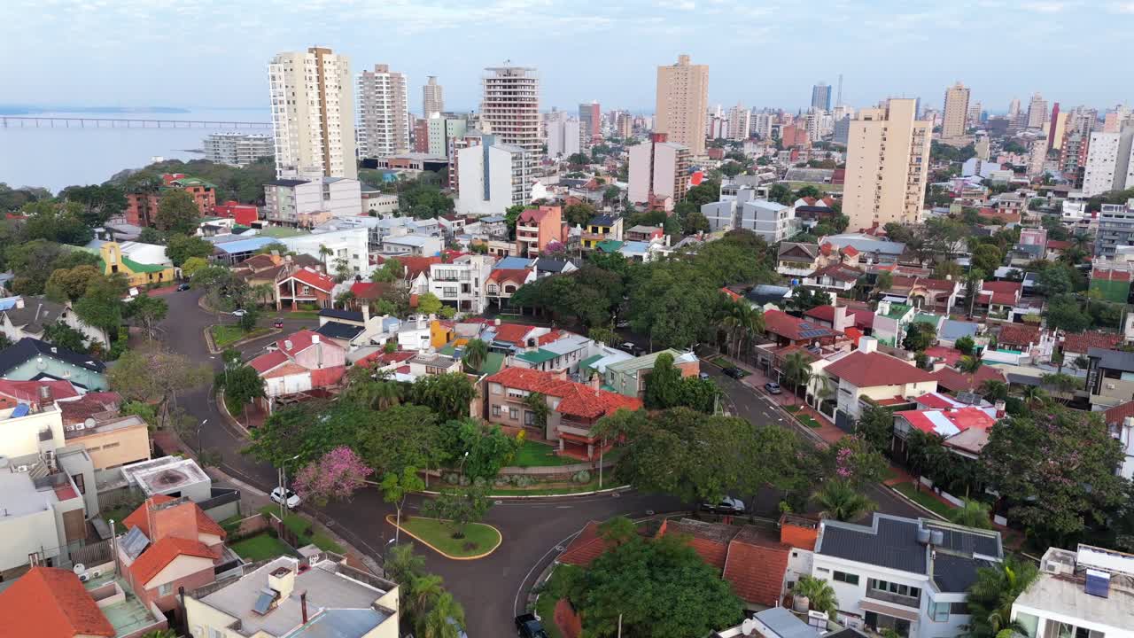 Amazing aerial cityscape of Posadas residential neighborhood with high-rise buildings on daily life, Misiones, Argentina