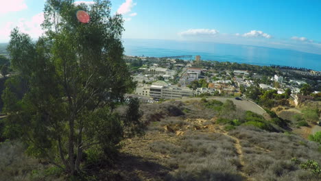 An-aerial-shot-reveals-the-California-coastal-city-of-Ventura-with-winding-roads-and-hills