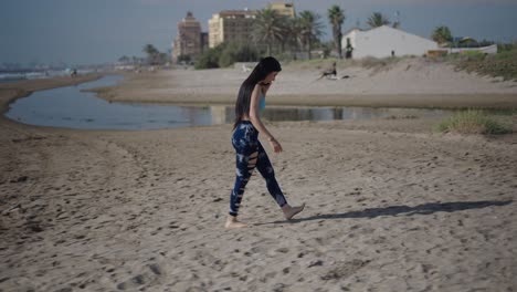 woman talking on phone at beach