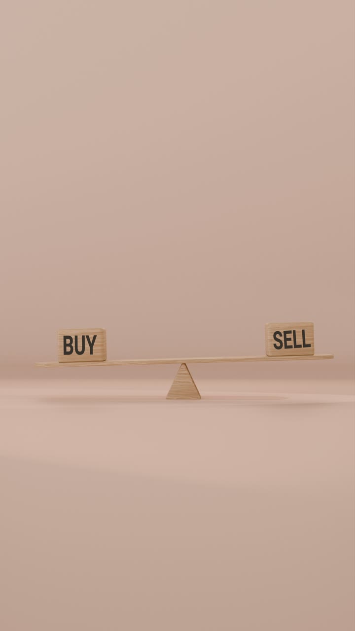 VERITCAL VIDEO OF BUY AND SELL BALANCING ON SEESAW
