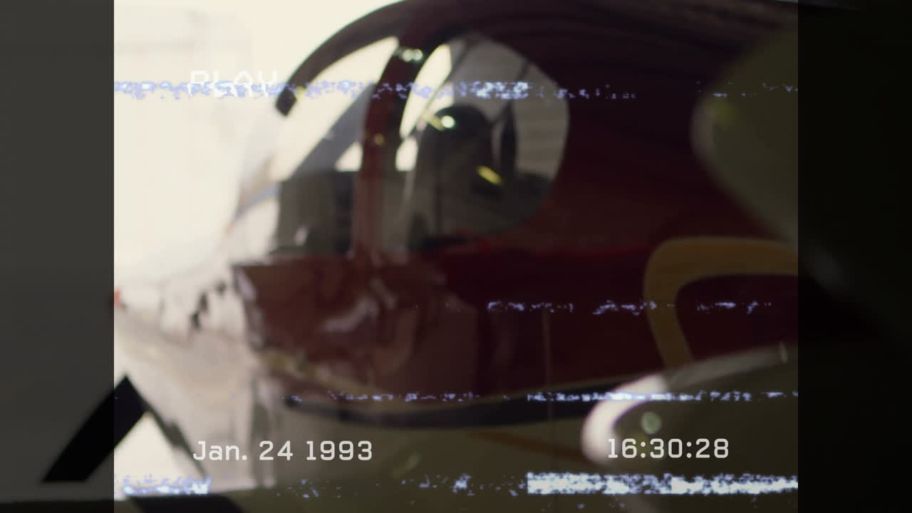 In airplane cockpit, vintage controls with animation of January 24, 1993 timestamp
