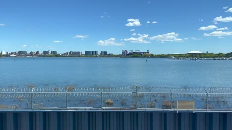 view of queens, new york, from laguardia airport across the bay, on a beautiful, sunny afternoon