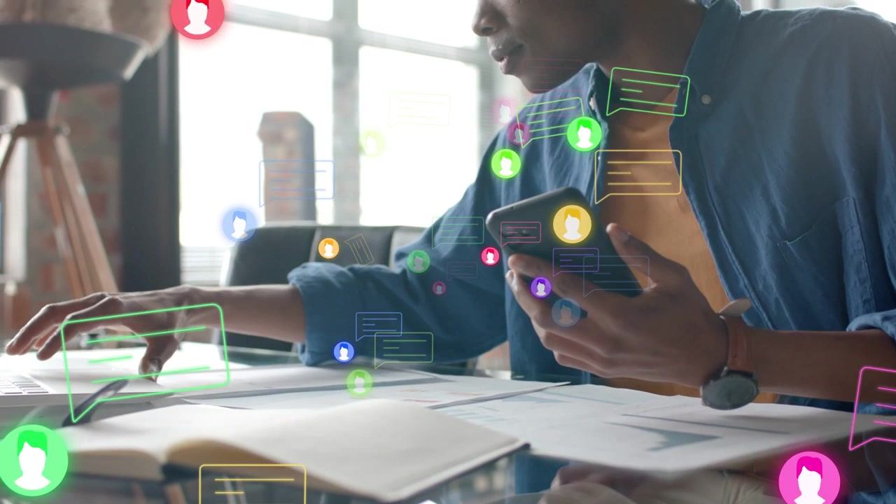 Man reacting to new messages, tapping phone, moving papers and managing business, chat icons rising