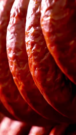 close-up of hanging cured sausages