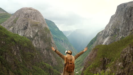 woman hiking in a norwegian fjord