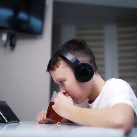 boy using tablet at home