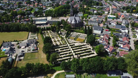 Aerial View of a Dutch Town with Church and Cemetery
