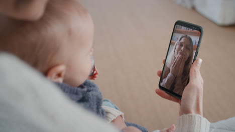 mother-and-baby-using-smartphone-having-video-chat-with-best-friend-waving-at-toddler-happy-mom-enjoying-sharing-motherhood-lifestyle-on-mobile-phone-screen-4k