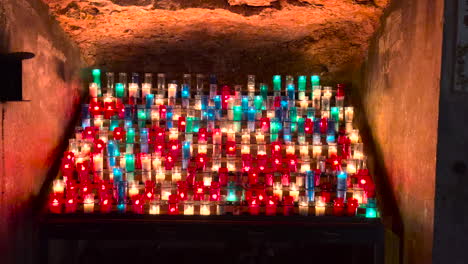 a vigil of candles burning