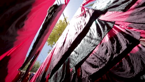 pink scarves hung in the medina of marrakech