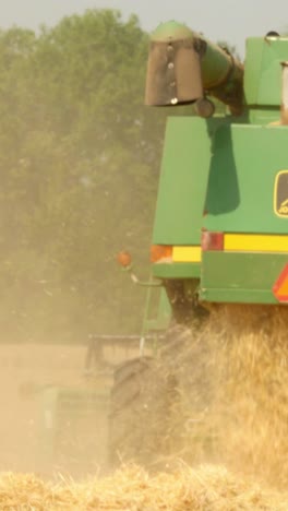 modern combine harvesting grain in the field