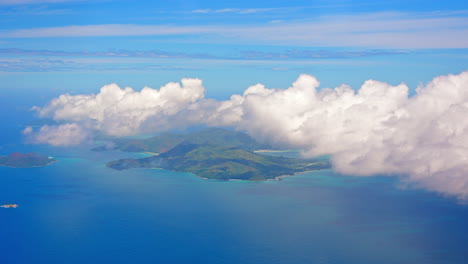 high view from airplane of mahè island in the seychelles