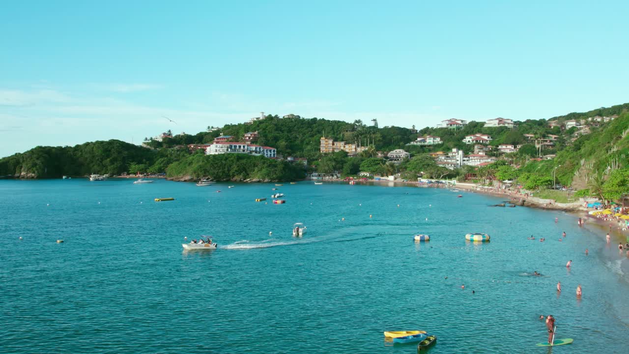 Flyover dolly in over Joao Fernandes beach, B&uacute;zios, Brazil