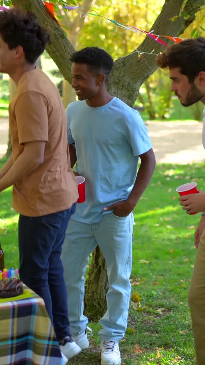 Friends Celebrating a Birthday Outdoors