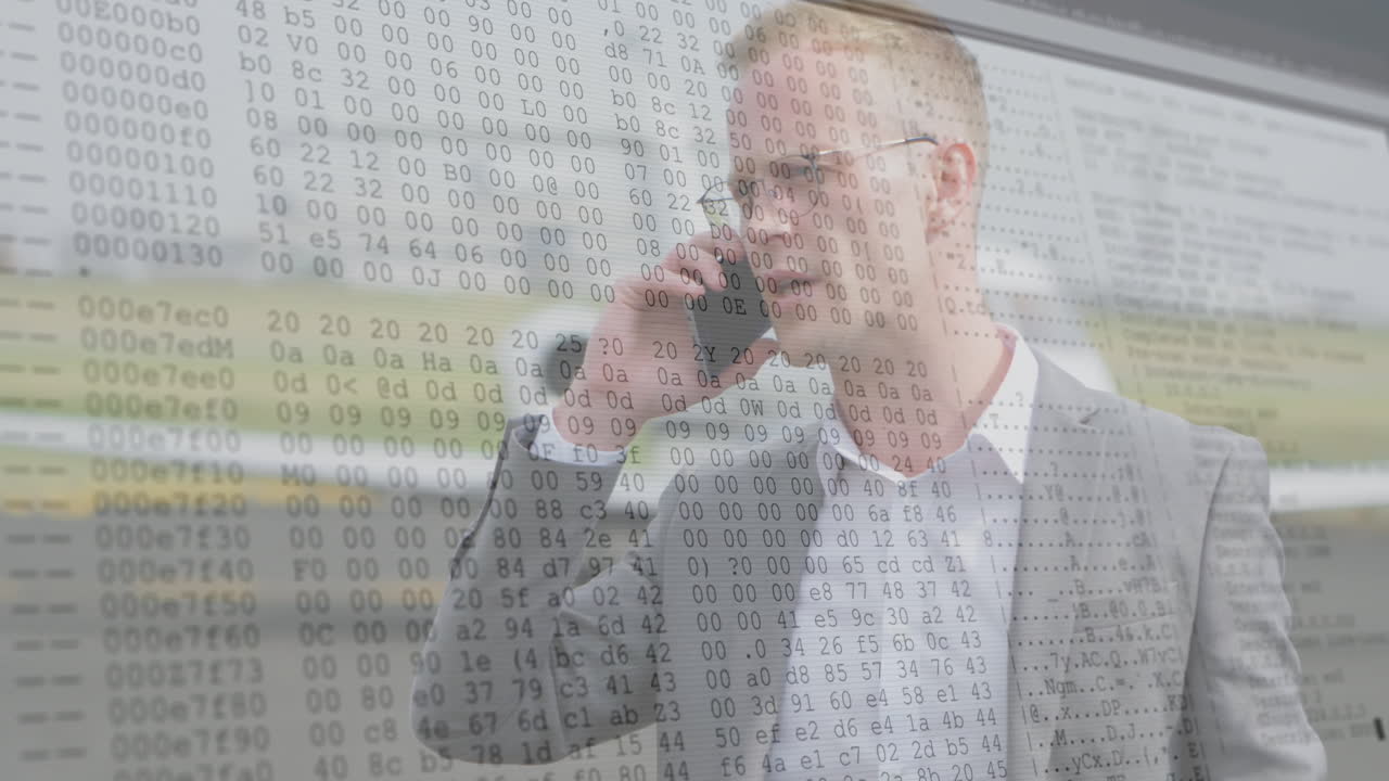 mid adult male professional talking on smartphone in office, showing cybersecurity code overlay