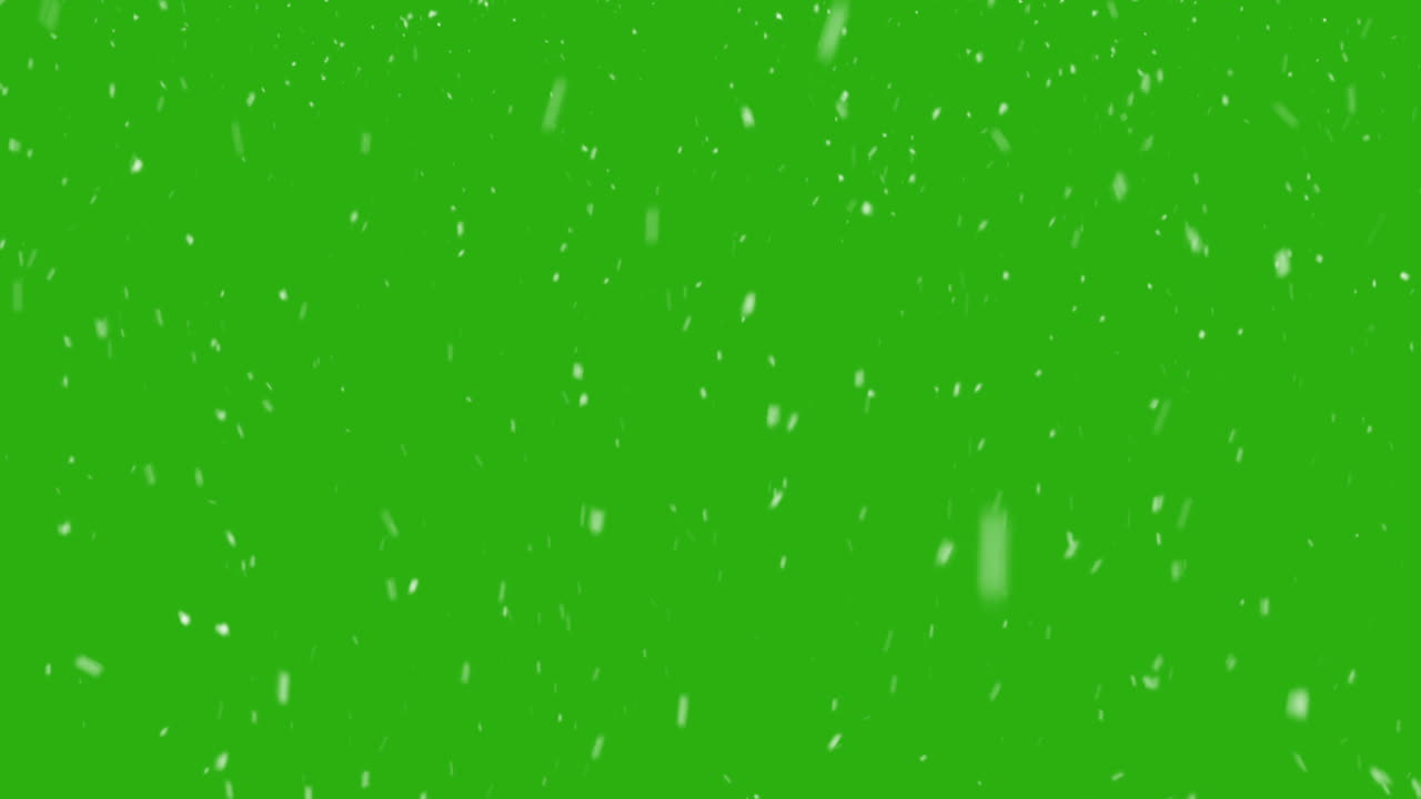 fiocchi di neve che cadono caotici su sfondo greenscreen, vfx