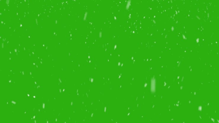 Snowflakes falling chaotic against greenscreen background, VFX