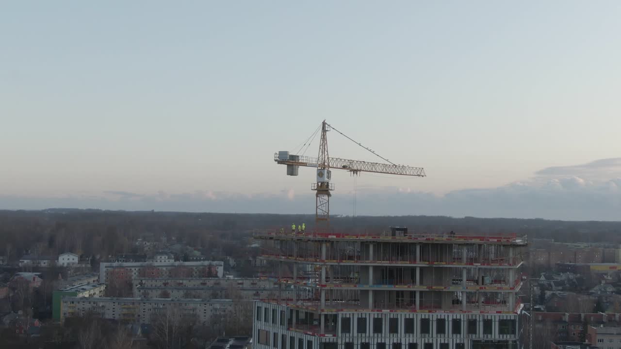 drone shot of construction of Paju 2 in Tartu, Estonia with boat on the turusild bridge
