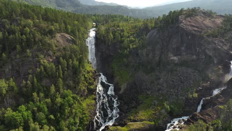 latefossen is one of the most visited waterfalls in norway and is located near skare and odda in the region hordaland, norway. consists of two separate streams flowing down from the lake lotevatnet.