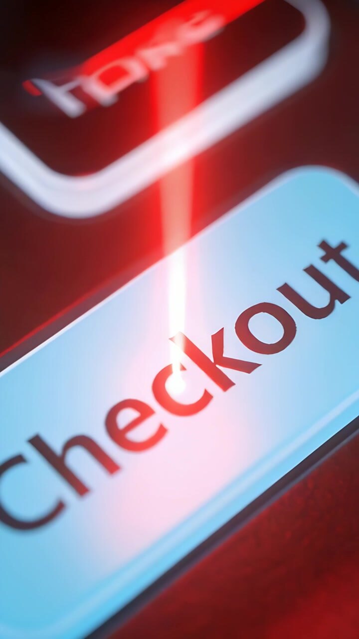Vertical video: Scanning red beam moving down toward Checkout button on glossy bezel, casting glow