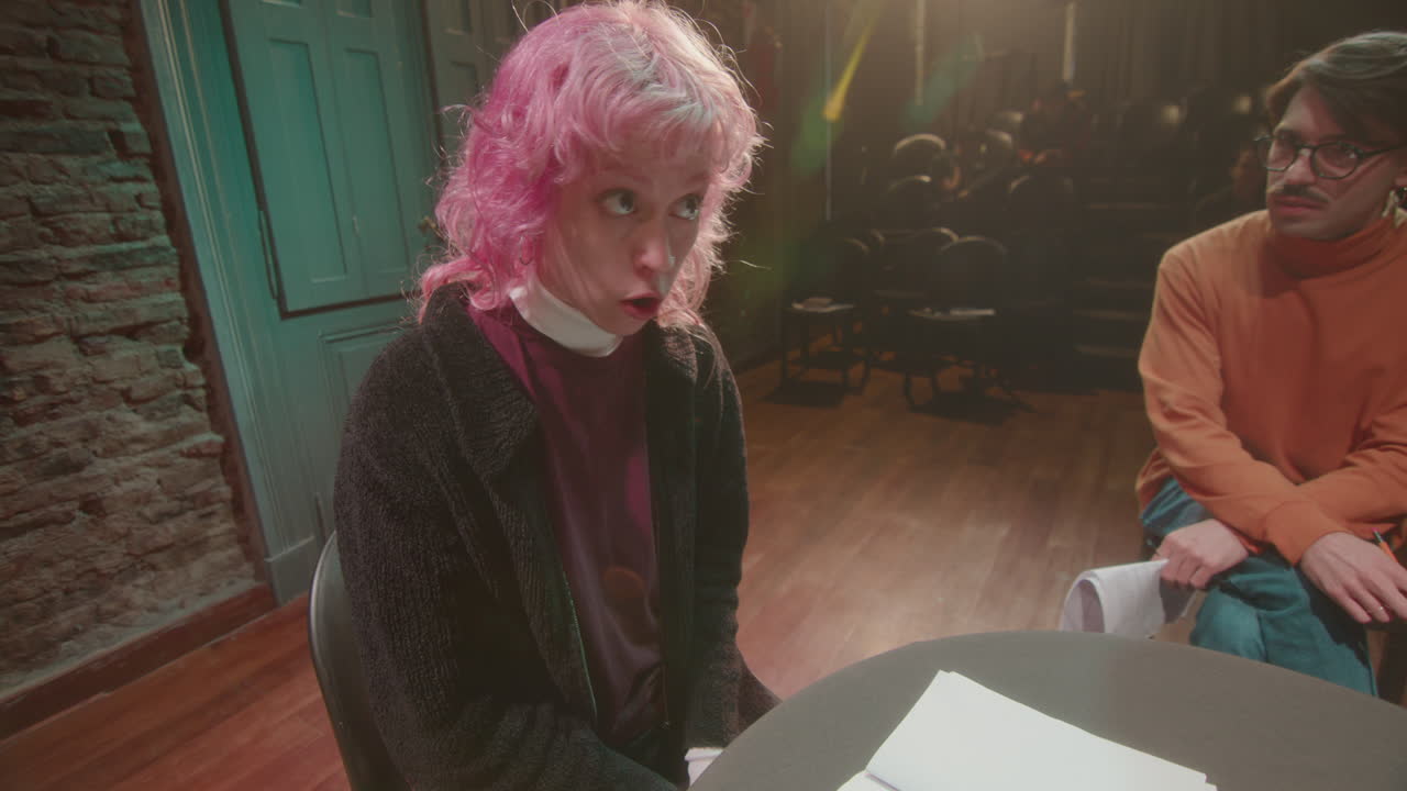 Actresses Performing Emotional Dialogue on Rehearsal with Stage Director