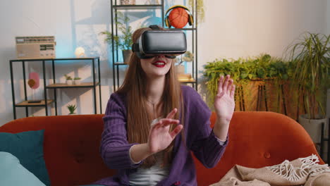 Woman-using-virtual-reality-futuristic-technology-headset-to-play-simulation-3D-video-game-at-home