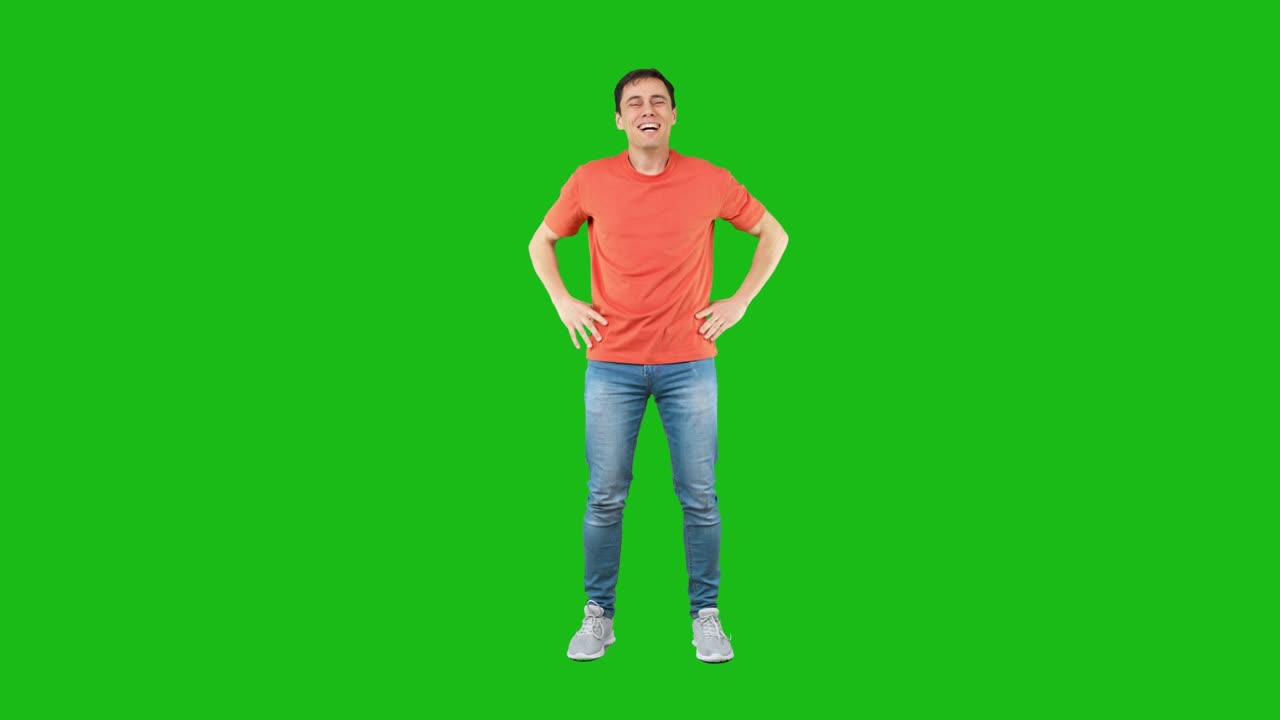 Excited man trying to hug camera. Green background