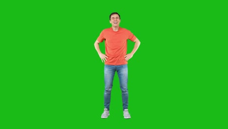 excited man trying to hug camera. green background