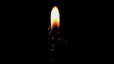 the spark and flame of a lighter