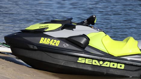 sequence of a jet ski launching into a lake