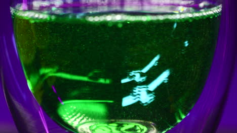 green liquid in a glass