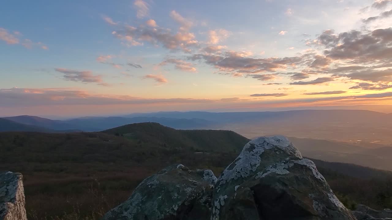 Mountain range during sunset stock