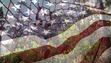 animación de la bandera de los estados unidos sobre un hombre afroamericano durante el entrenamiento de carrera de obstáculos