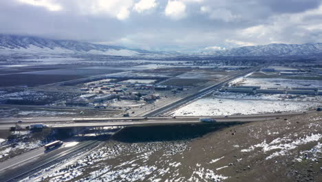 flying over highway 58 on a wintery, snowy day in tehachapi, ca