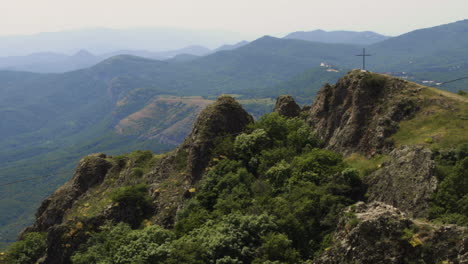 isolated cross over mestia mountain in svaneti, georgia